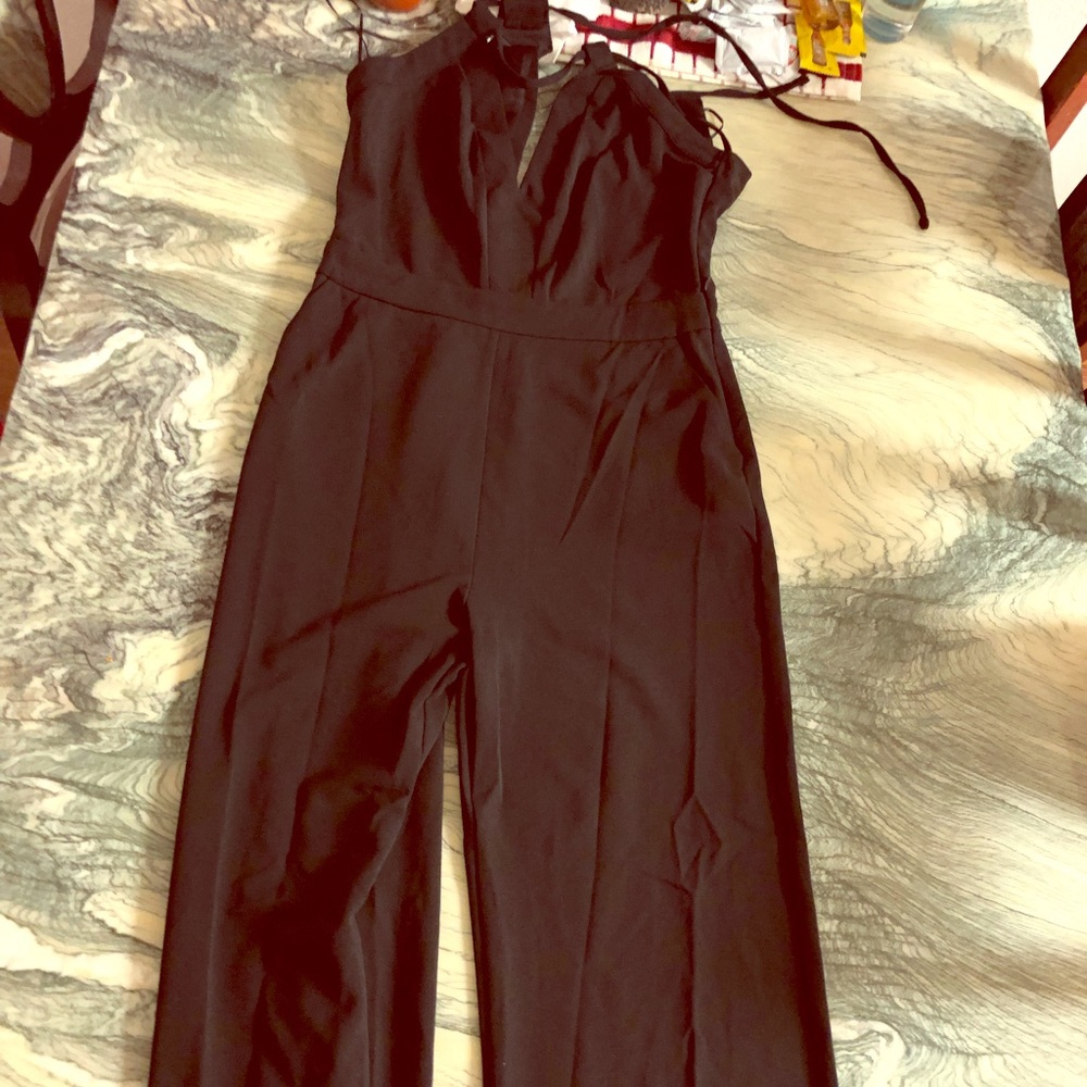 Well Dressed Jumpsuit from Fashion Nova